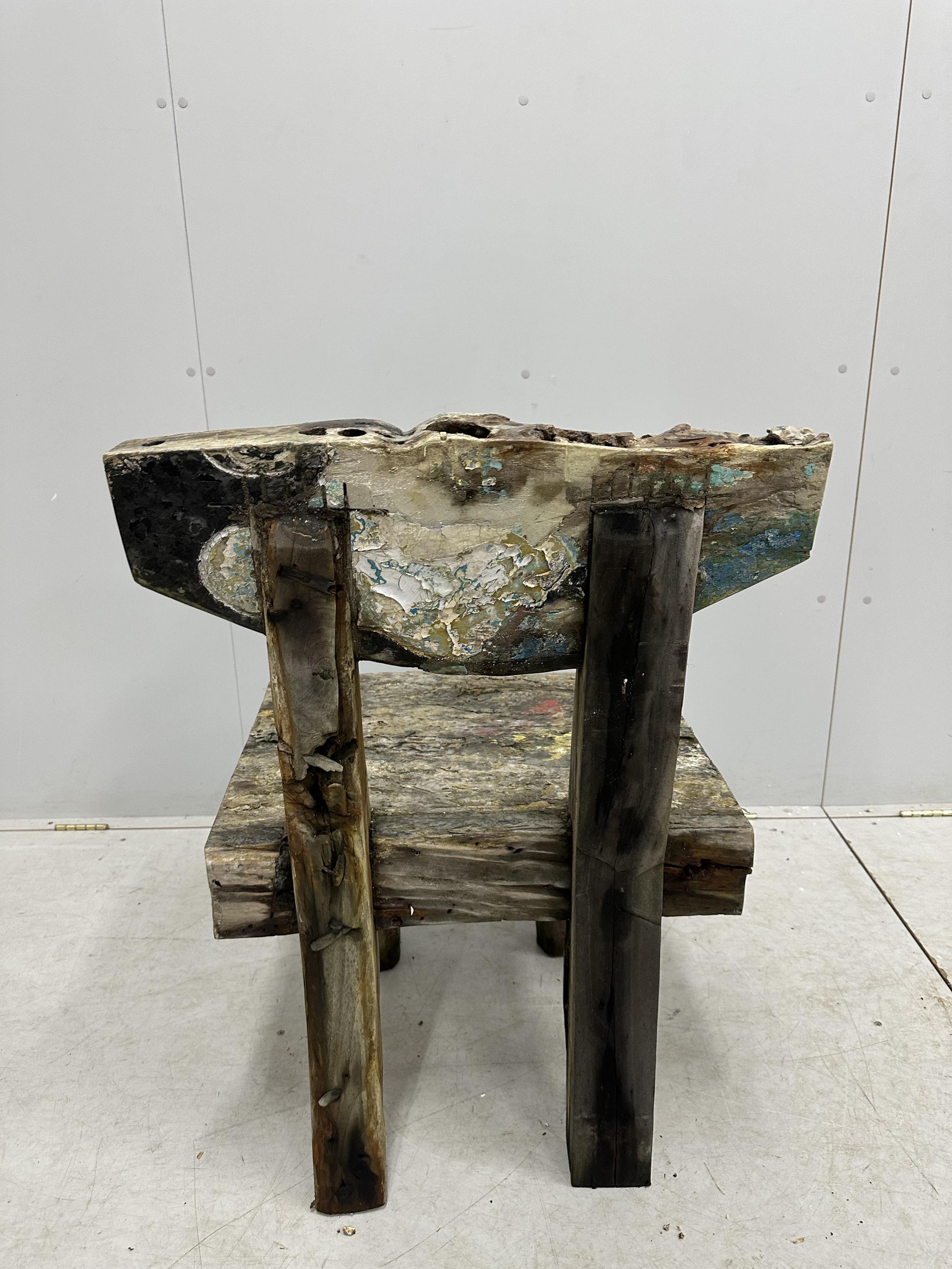 A painted primitive style chair, width 60cm, depth 53cm, height 89cm. Condition - fair